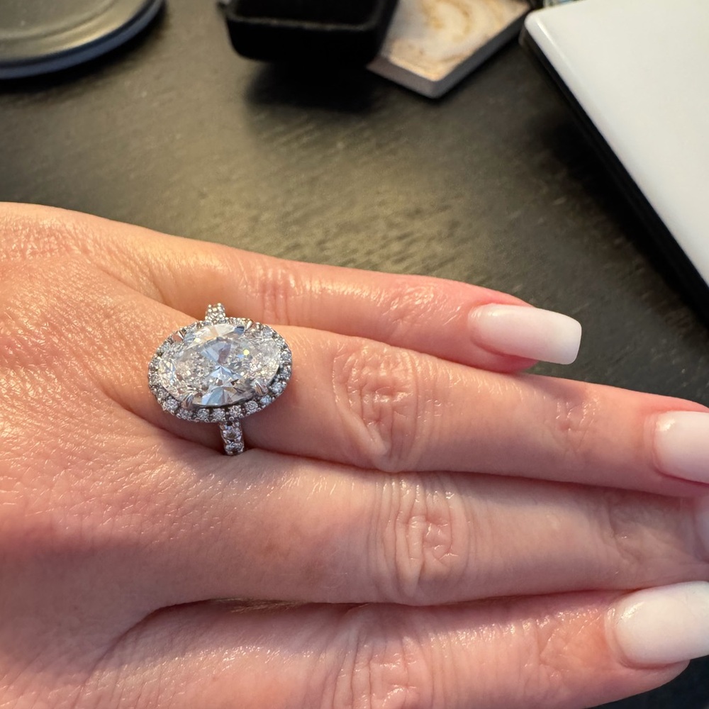 Sparkling Halo Oval Engagement Ring - White Gold Tone